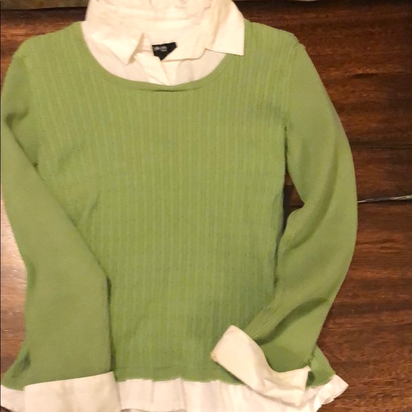 green sweater with white collar